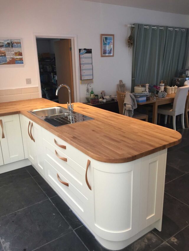 kitchen sink in new wooden kitchen counter top